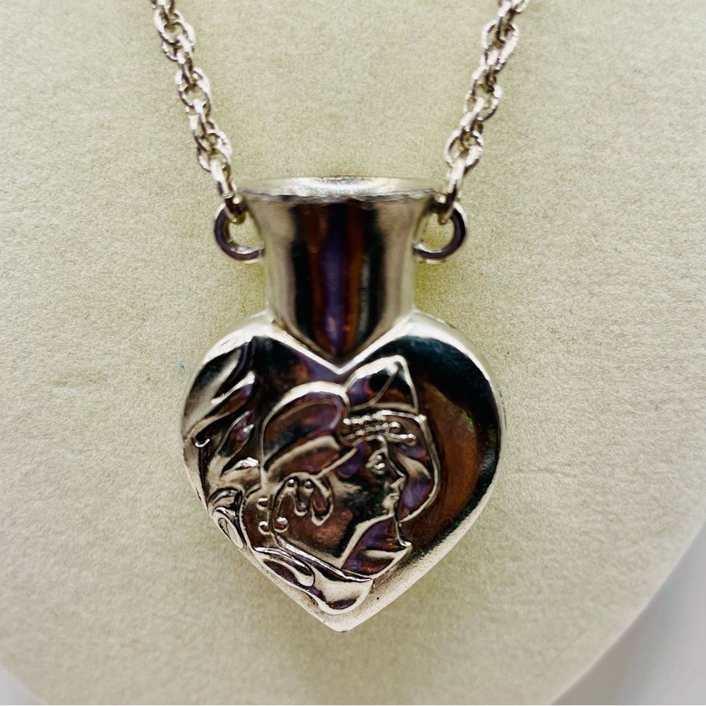 Vintage art nouveau heart vase pendant necklace. Silver tone. 30 inch chain.